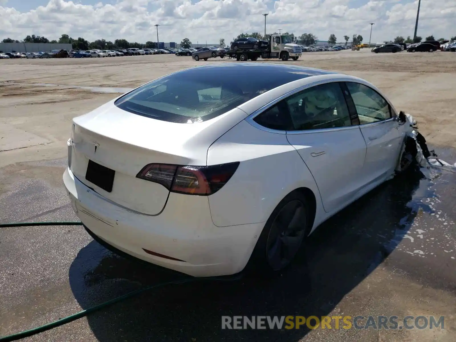 4 Photograph of a damaged car 5YJ3E1EA5KF484080 TESLA MODEL 3 2019