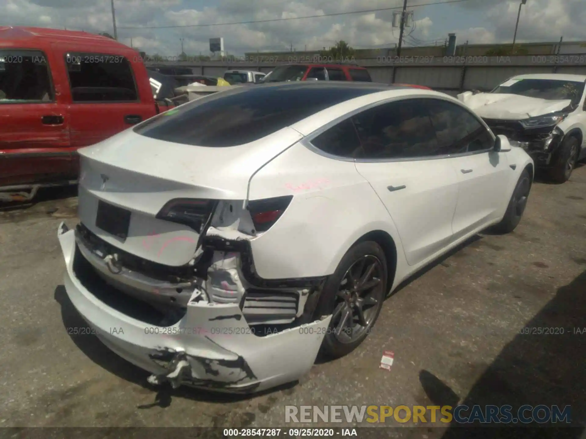 4 Photograph of a damaged car 5YJ3E1EA6KF310194 TESLA MODEL 3 2019