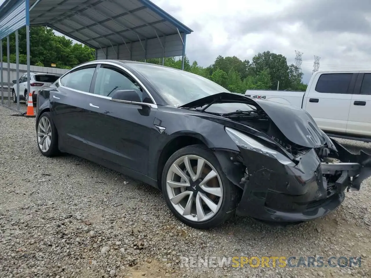 4 Photograph of a damaged car 5YJ3E1EA6KF310938 TESLA MODEL 3 2019