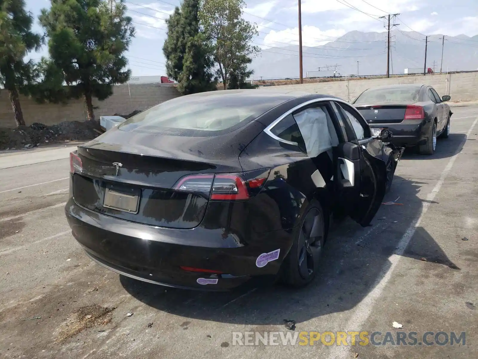 4 Photograph of a damaged car 5YJ3E1EA6KF311975 TESLA MODEL 3 2019