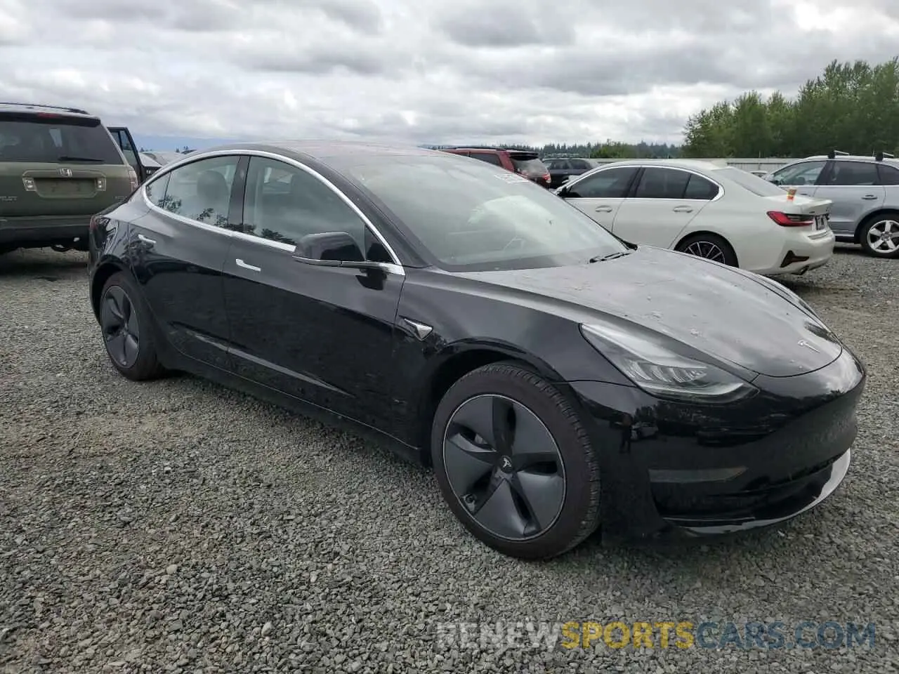 4 Photograph of a damaged car 5YJ3E1EA6KF324225 TESLA MODEL 3 2019