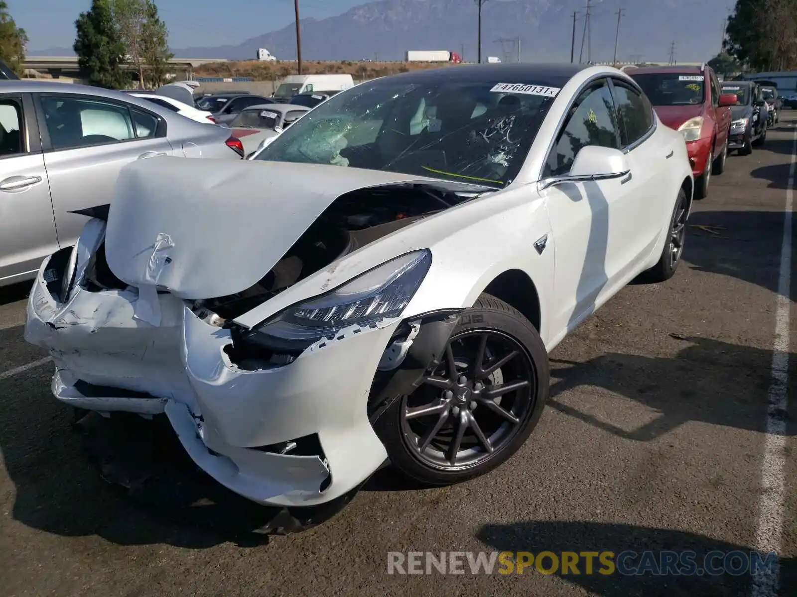 2 Photograph of a damaged car 5YJ3E1EA6KF397188 TESLA MODEL 3 2019