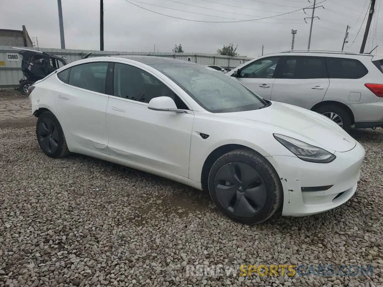 4 Photograph of a damaged car 5YJ3E1EA6KF412224 TESLA MODEL 3 2019