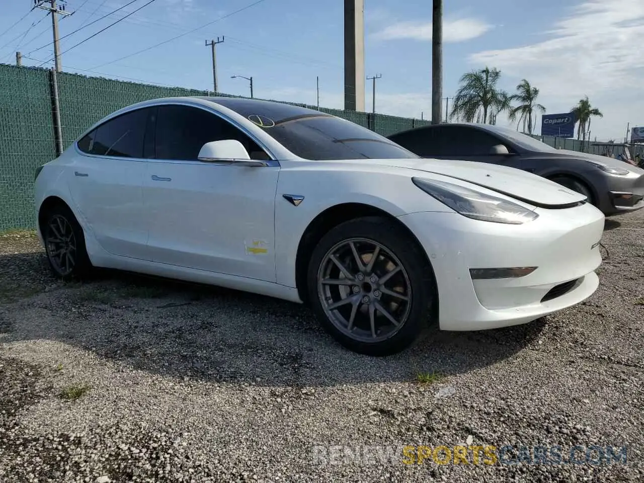 4 Photograph of a damaged car 5YJ3E1EA6KF483052 TESLA MODEL 3 2019