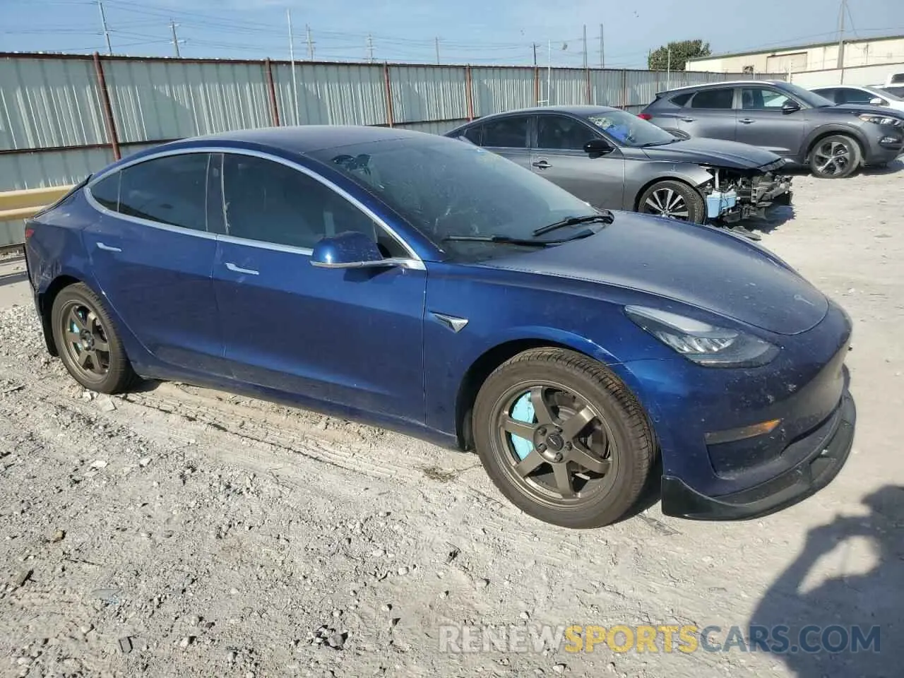 4 Photograph of a damaged car 5YJ3E1EA7KF299206 TESLA MODEL 3 2019