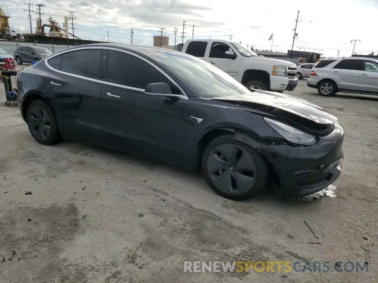 4 Photograph of a damaged car 5YJ3E1EA7KF409753 TESLA MODEL 3 2019