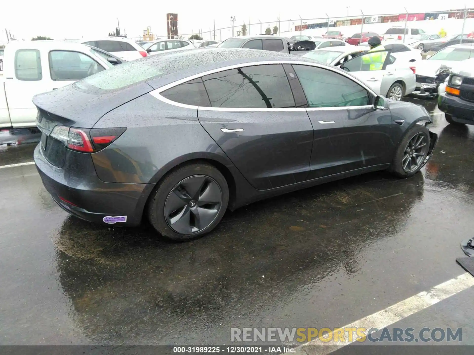 4 Photograph of a damaged car 5YJ3E1EA7KF411275 TESLA MODEL 3 2019