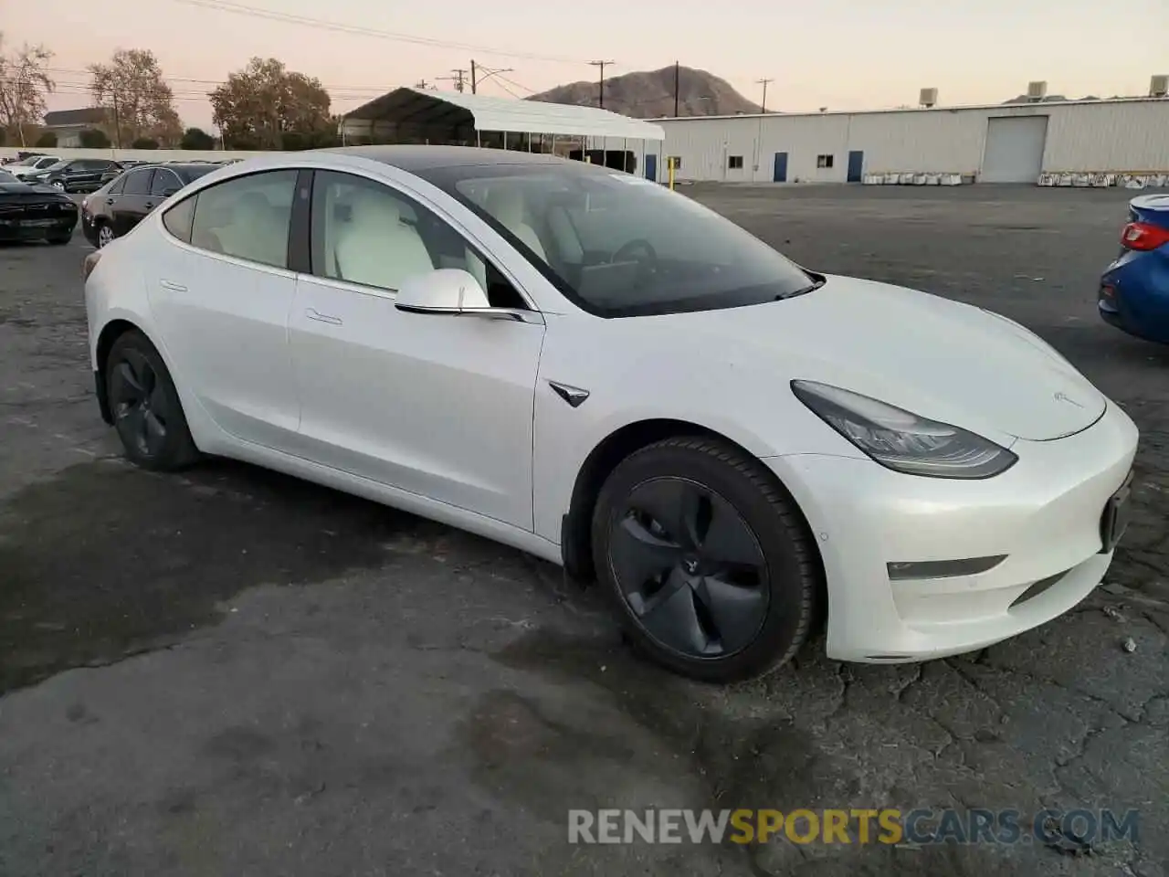 4 Photograph of a damaged car 5YJ3E1EA7KF431784 TESLA MODEL 3 2019