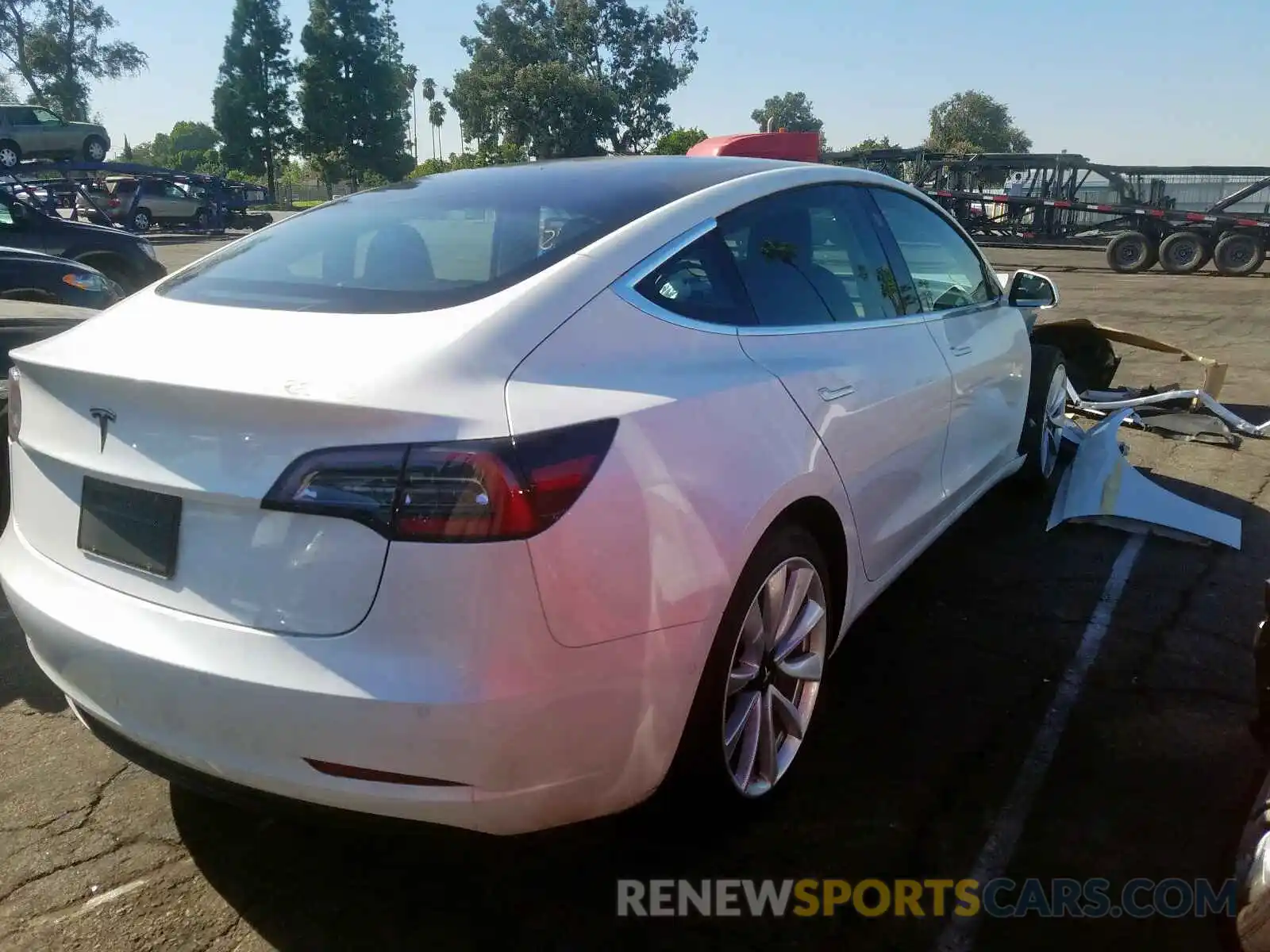 4 Photograph of a damaged car 5YJ3E1EA8KF311699 TESLA MODEL 3 2019