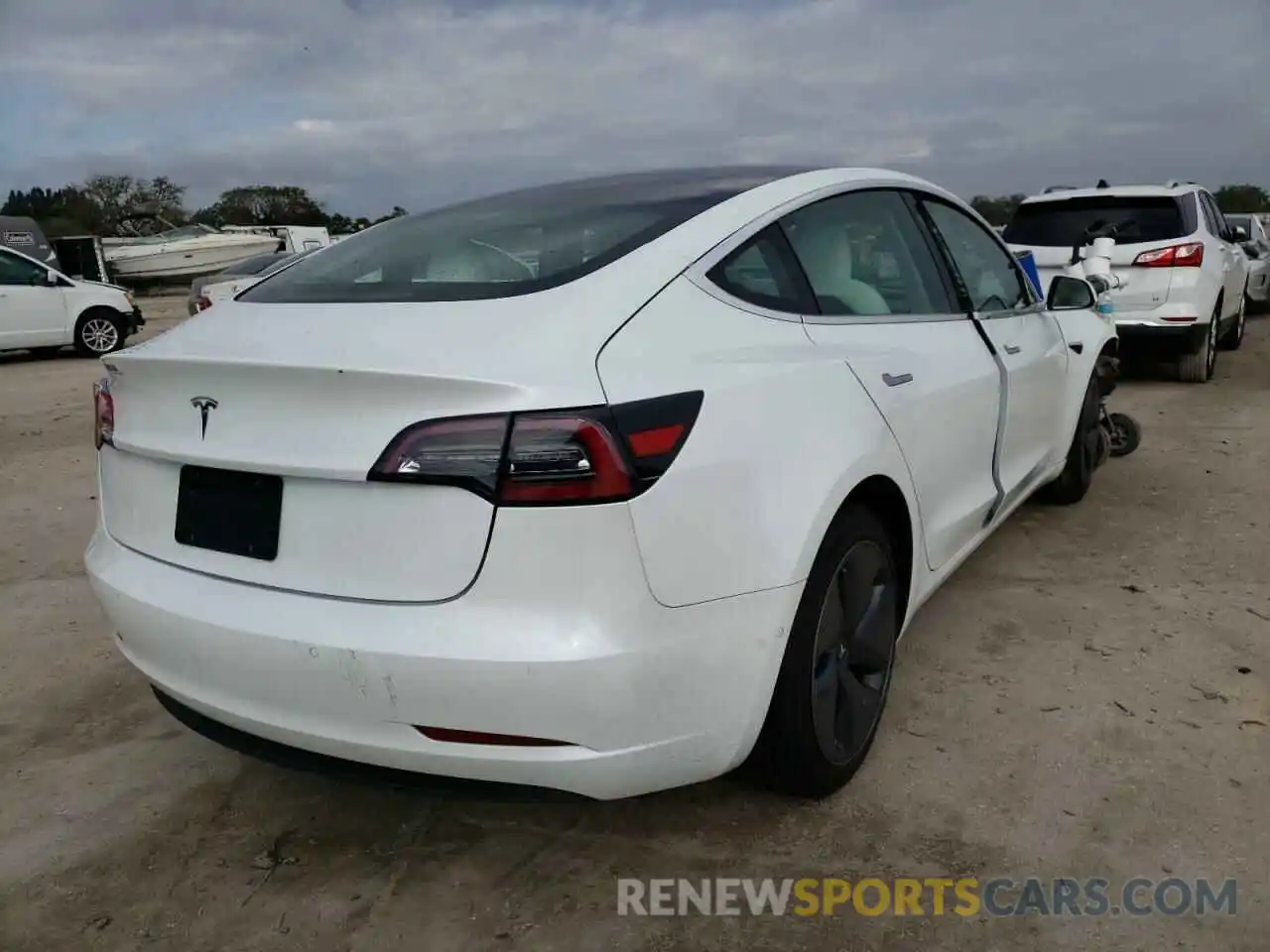 4 Photograph of a damaged car 5YJ3E1EA8KF486440 TESLA MODEL 3 2019