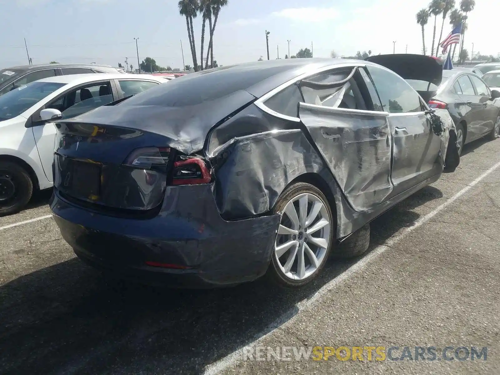 4 Photograph of a damaged car 5YJ3E1EA8KF486731 TESLA MODEL 3 2019