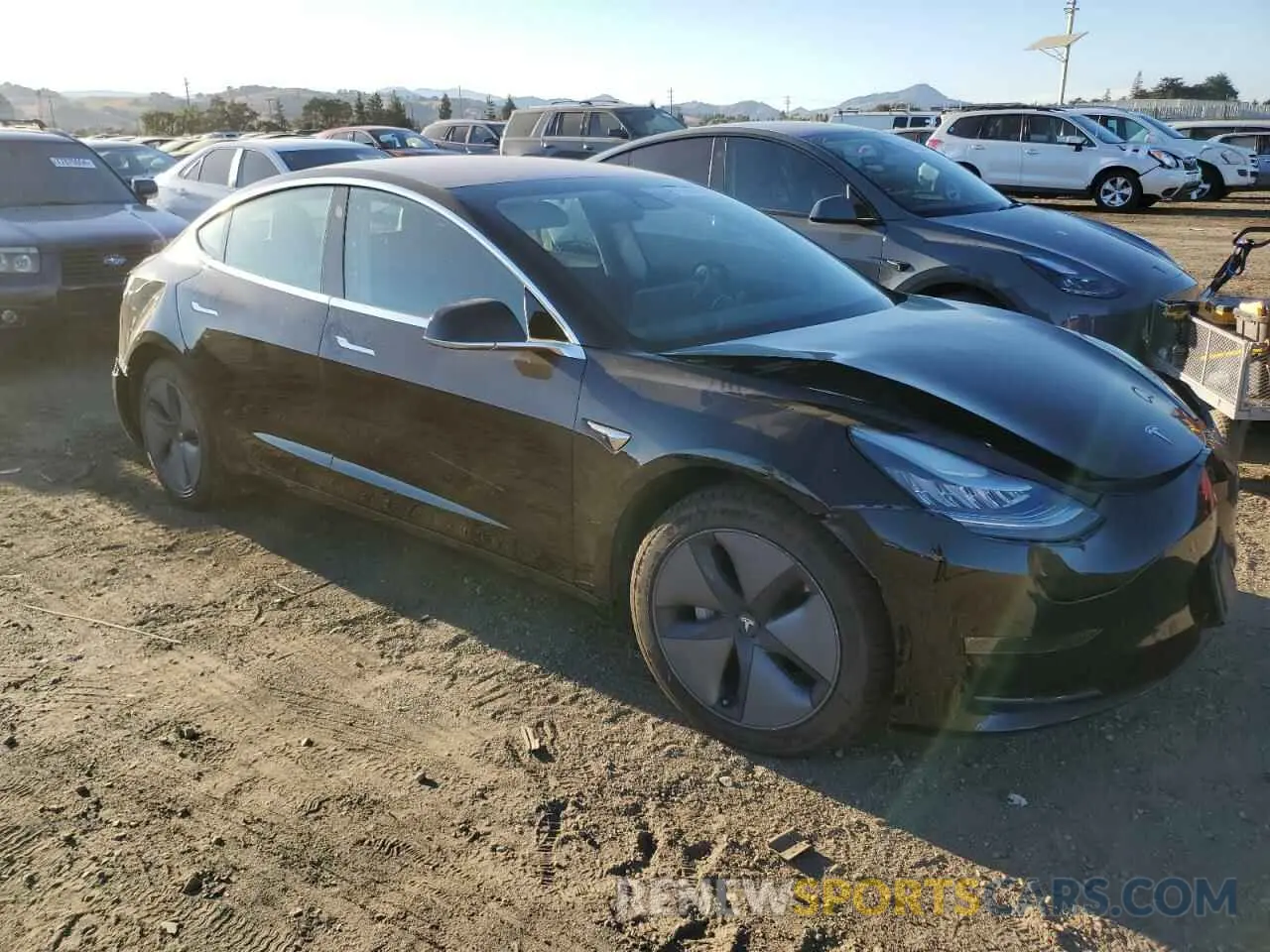 4 Photograph of a damaged car 5YJ3E1EA9KF305555 TESLA MODEL 3 2019