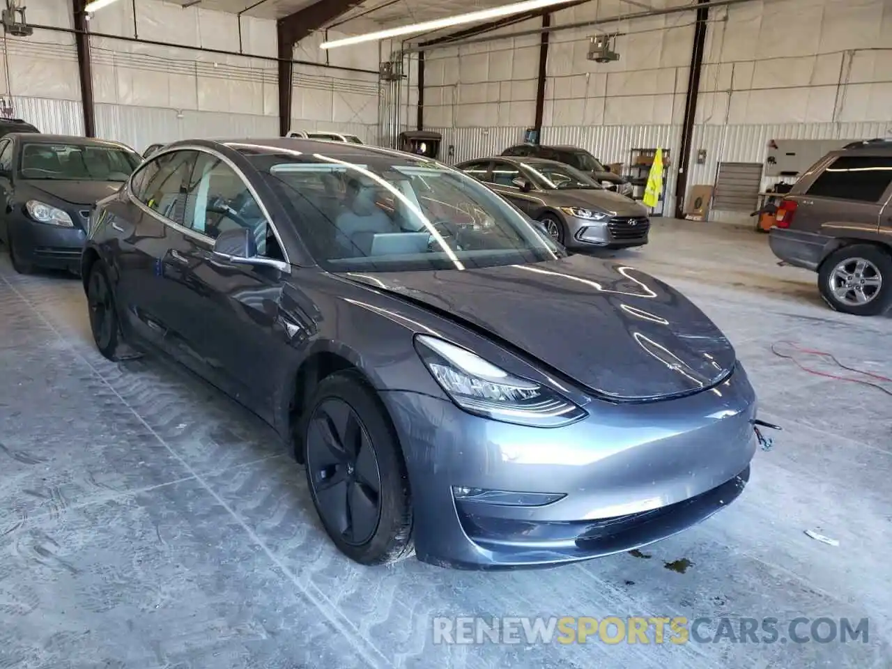 1 Photograph of a damaged car 5YJ3E1EA9KF313588 TESLA MODEL 3 2019