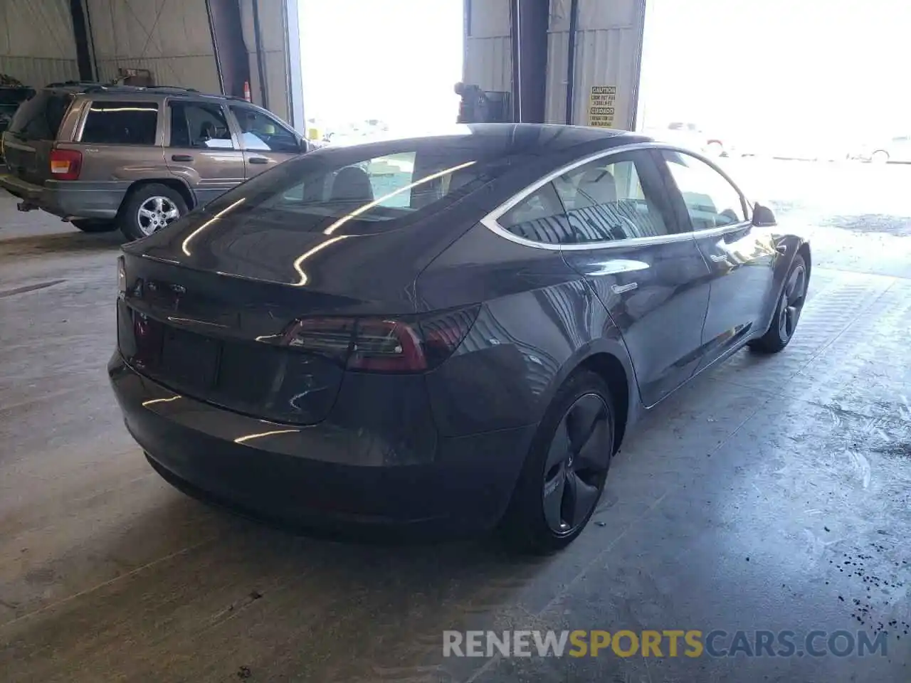 4 Photograph of a damaged car 5YJ3E1EA9KF313588 TESLA MODEL 3 2019