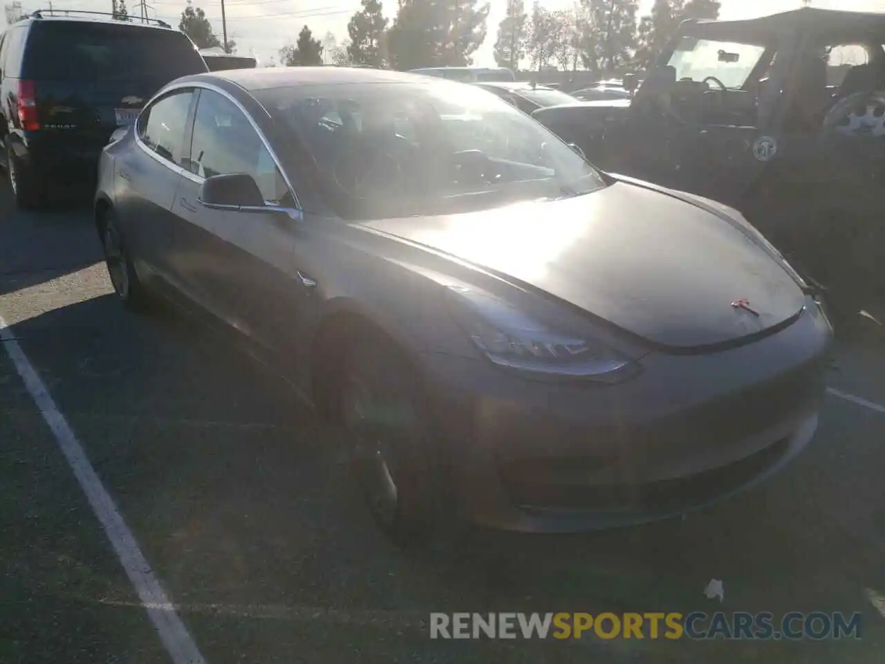 4 Photograph of a damaged car 5YJ3E1EA9KF324252 TESLA MODEL 3 2019