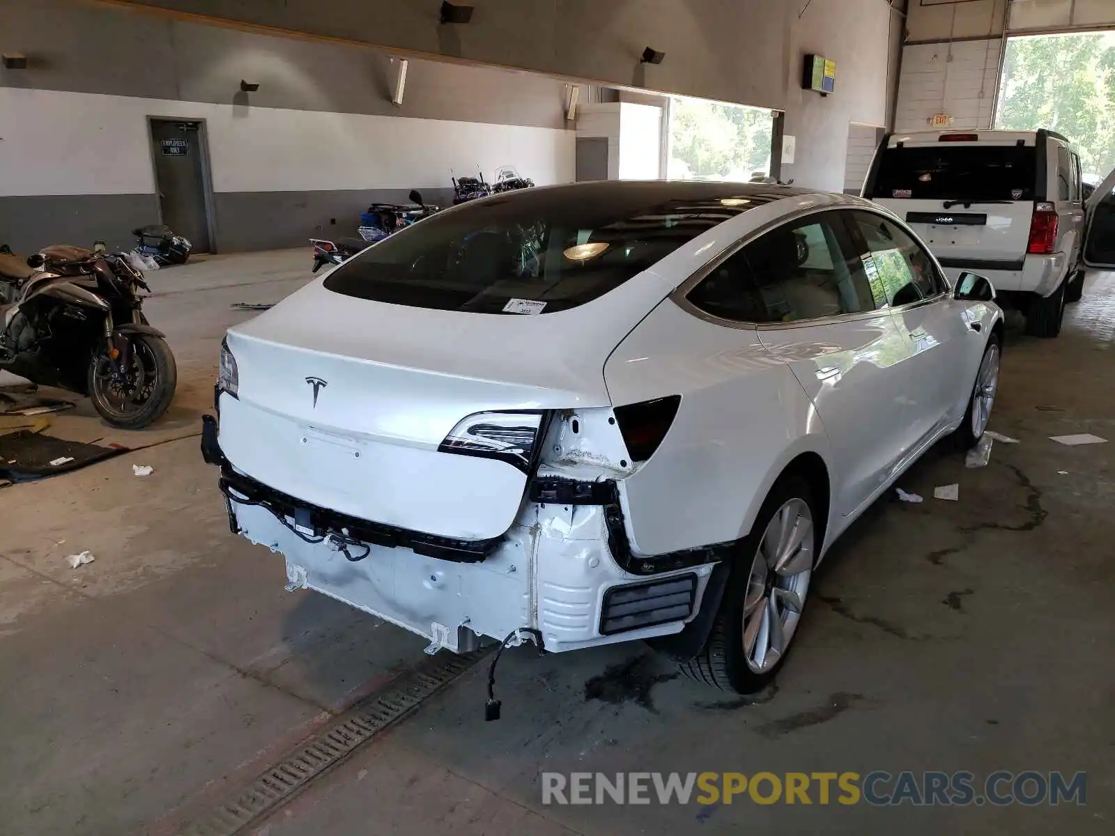 4 Photograph of a damaged car 5YJ3E1EA9KF436257 TESLA MODEL 3 2019