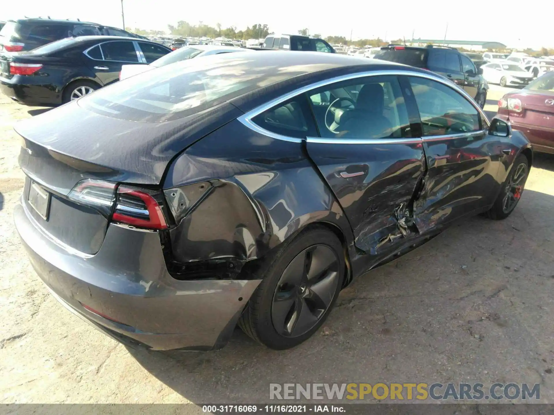 4 Photograph of a damaged car 5YJ3E1EAXKF307315 TESLA MODEL 3 2019