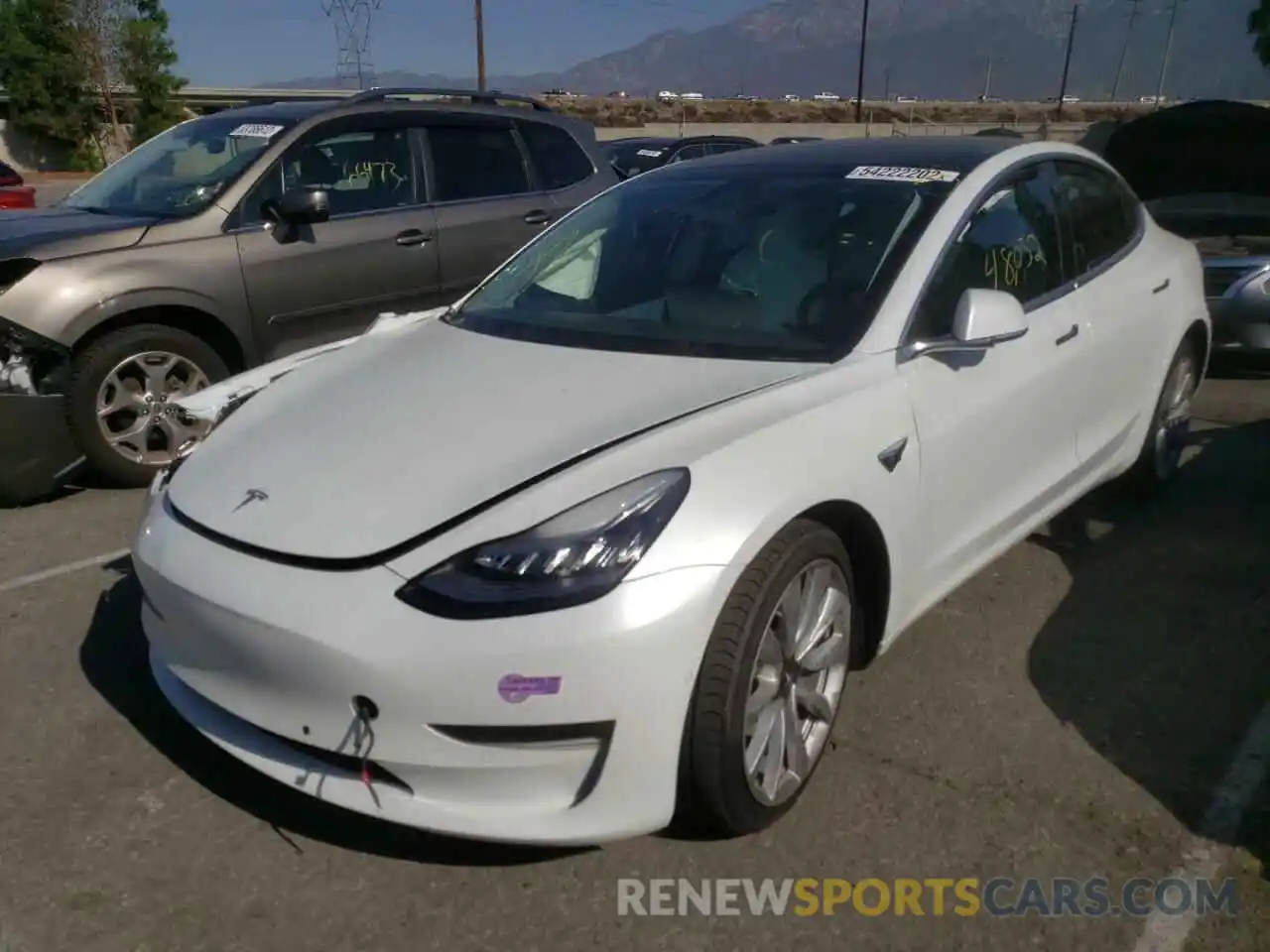 2 Photograph of a damaged car 5YJ3E1EAXKF332943 TESLA MODEL 3 2019