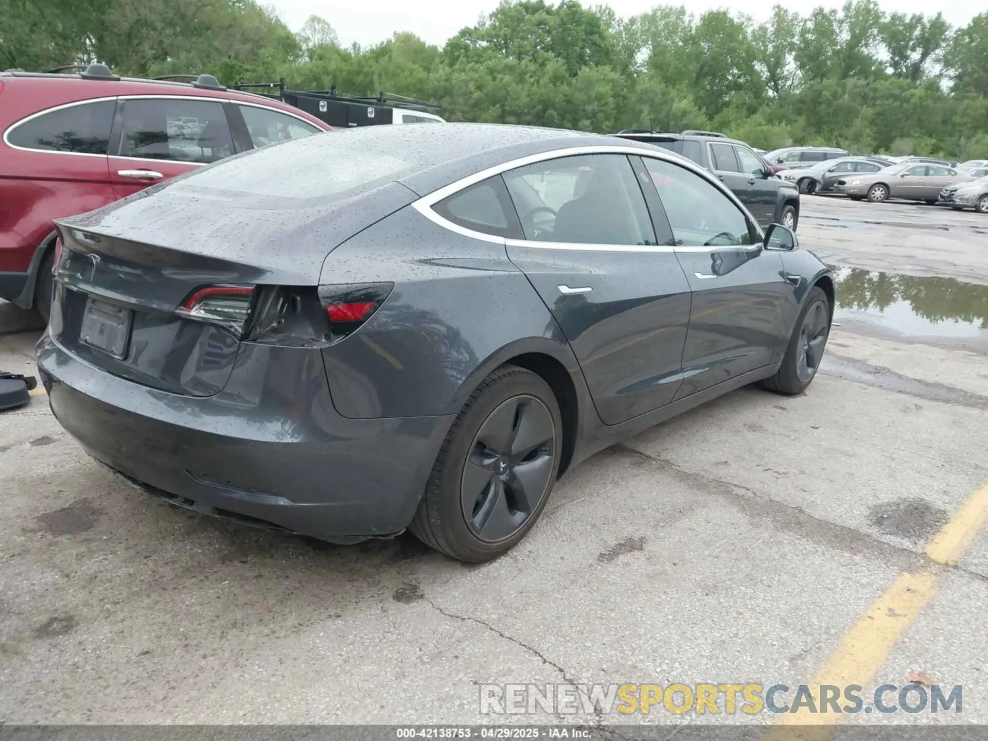 4 Photograph of a damaged car 5YJ3E1EAXKF396285 TESLA MODEL 3 2019
