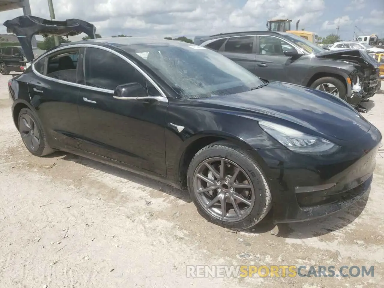 4 Photograph of a damaged car 5YJ3E1EAXKF399199 TESLA MODEL 3 2019