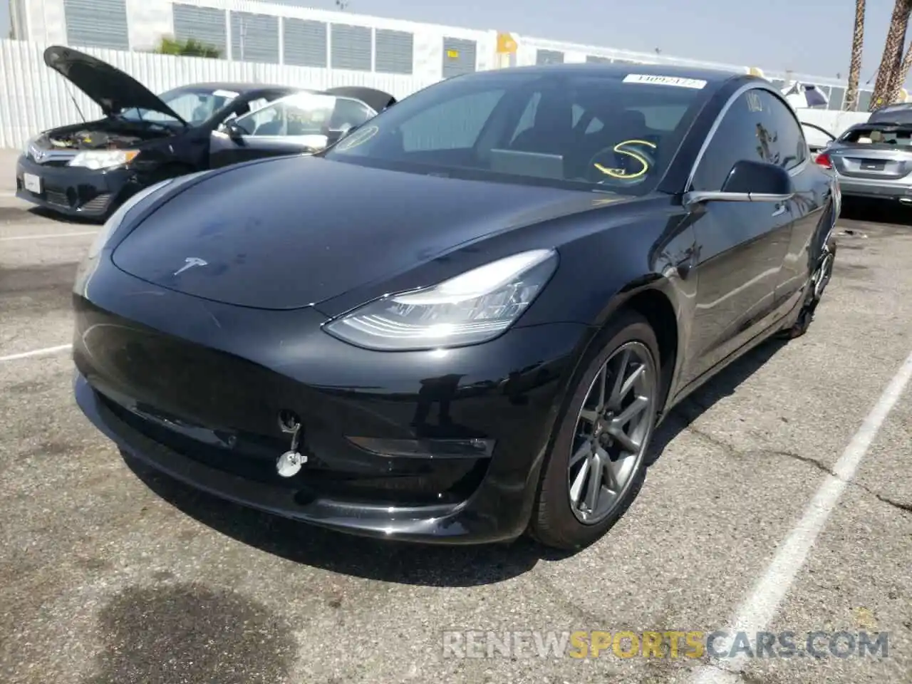 2 Photograph of a damaged car 5YJ3E1EAXKF424523 TESLA MODEL 3 2019