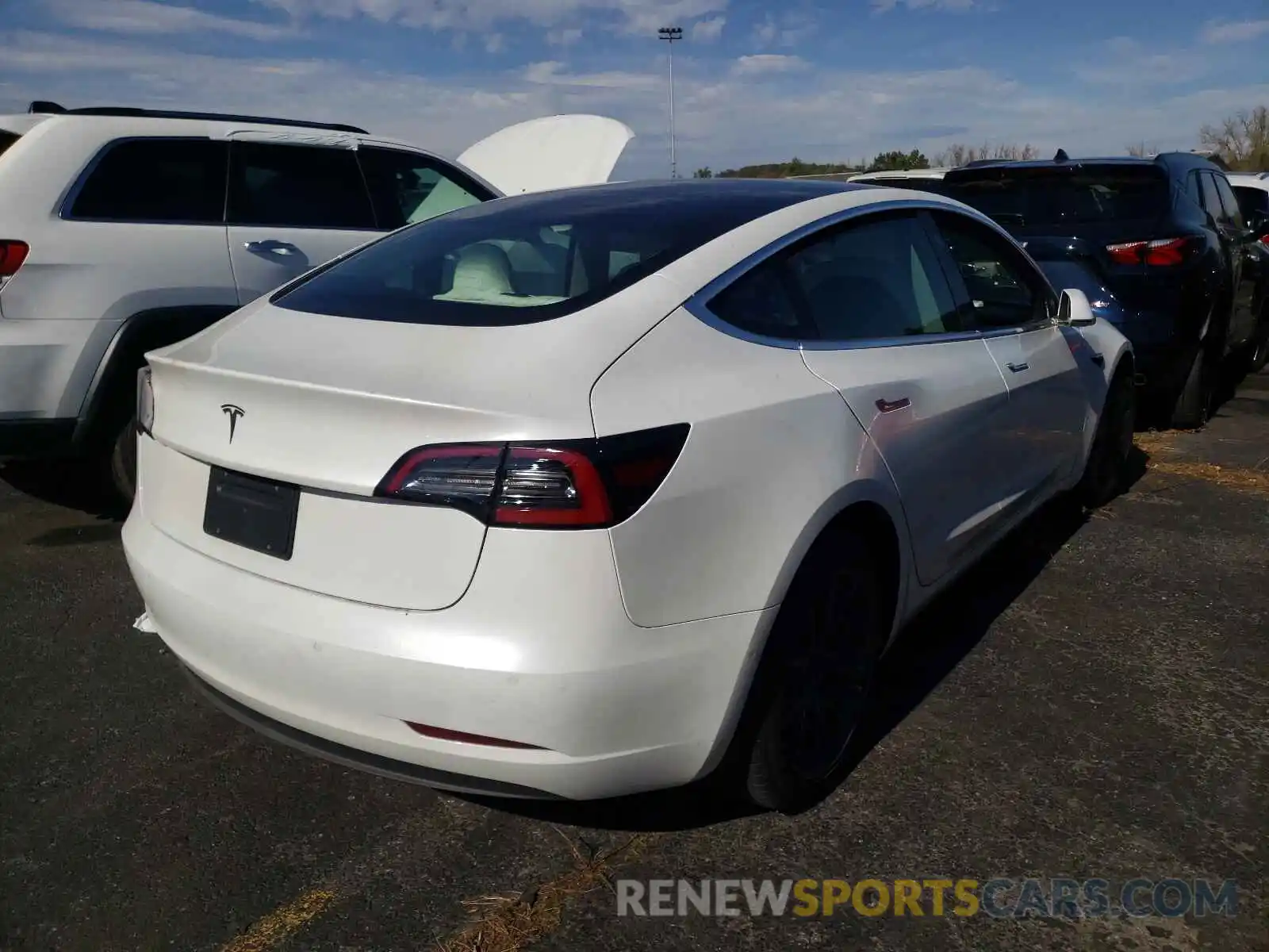 4 Photograph of a damaged car 5YJ3E1EAXKF486665 TESLA MODEL 3 2019