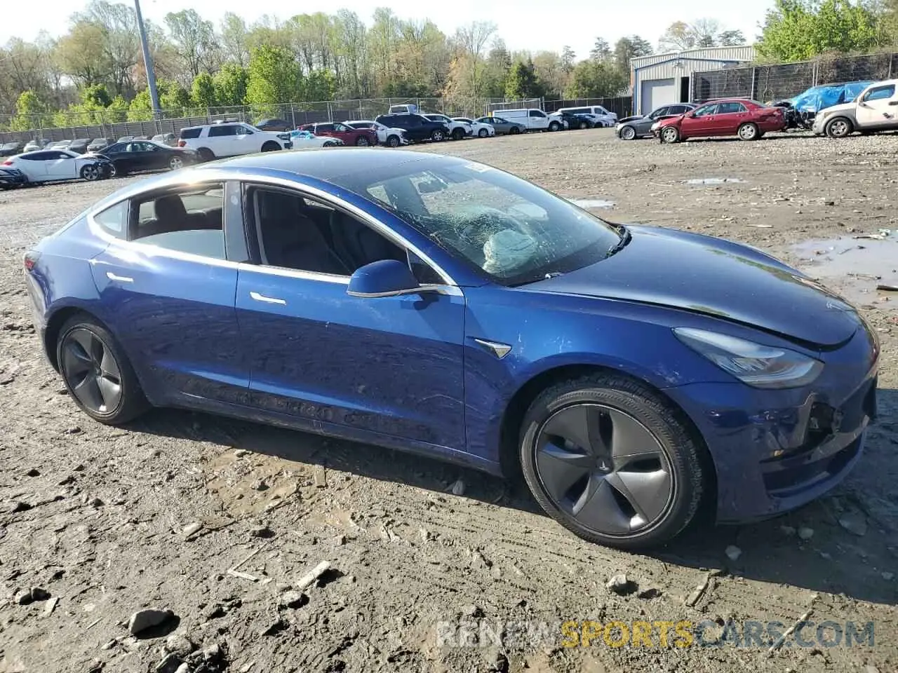 4 Photograph of a damaged car 5YJ3E1EB0KF452758 TESLA MODEL 3 2019