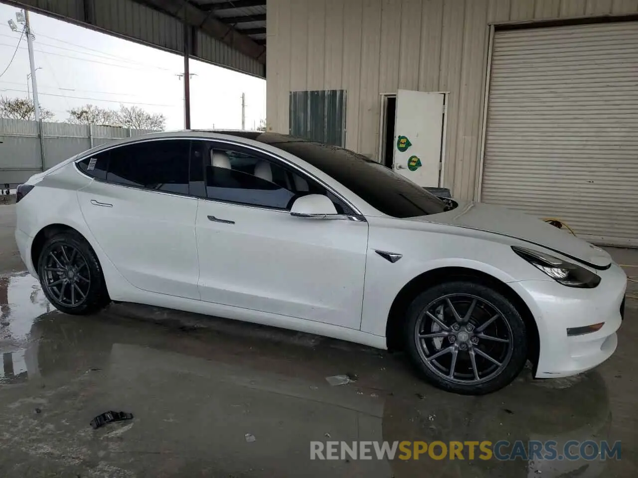 4 Photograph of a damaged car 5YJ3E1EB0KF513168 TESLA MODEL 3 2019