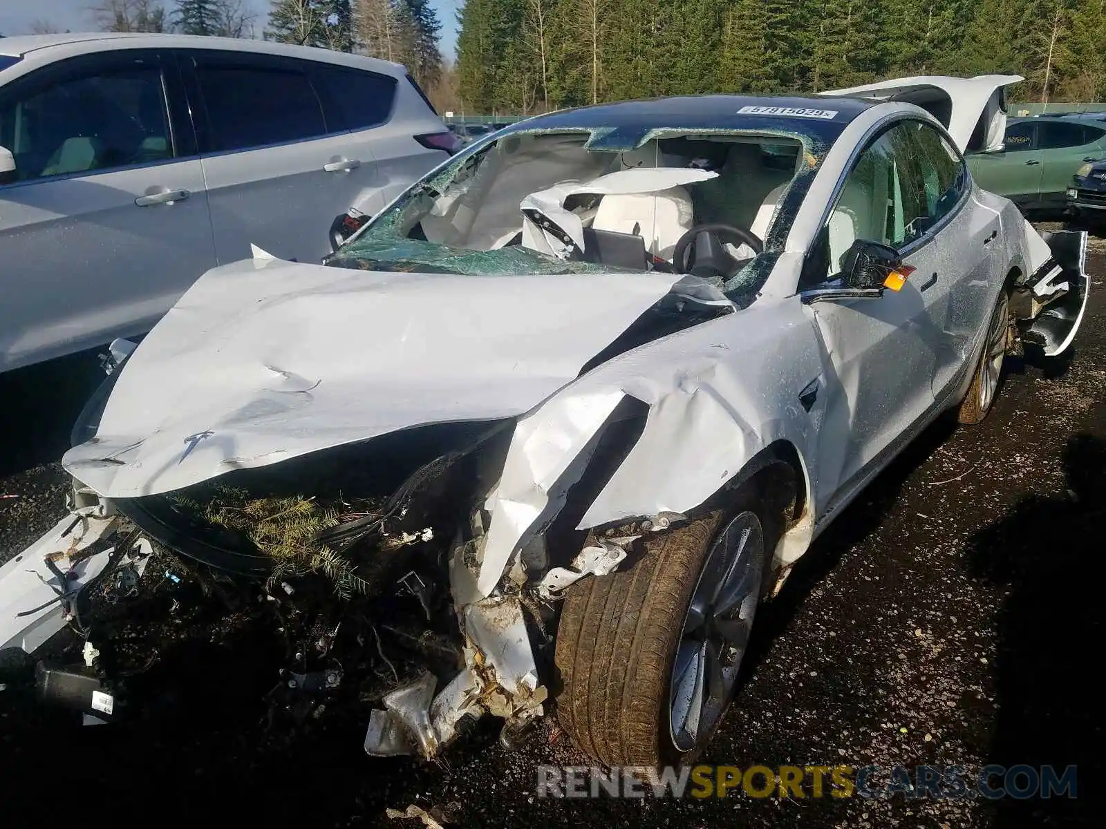 2 Photograph of a damaged car 5YJ3E1EB0KF513347 TESLA MODEL 3 2019