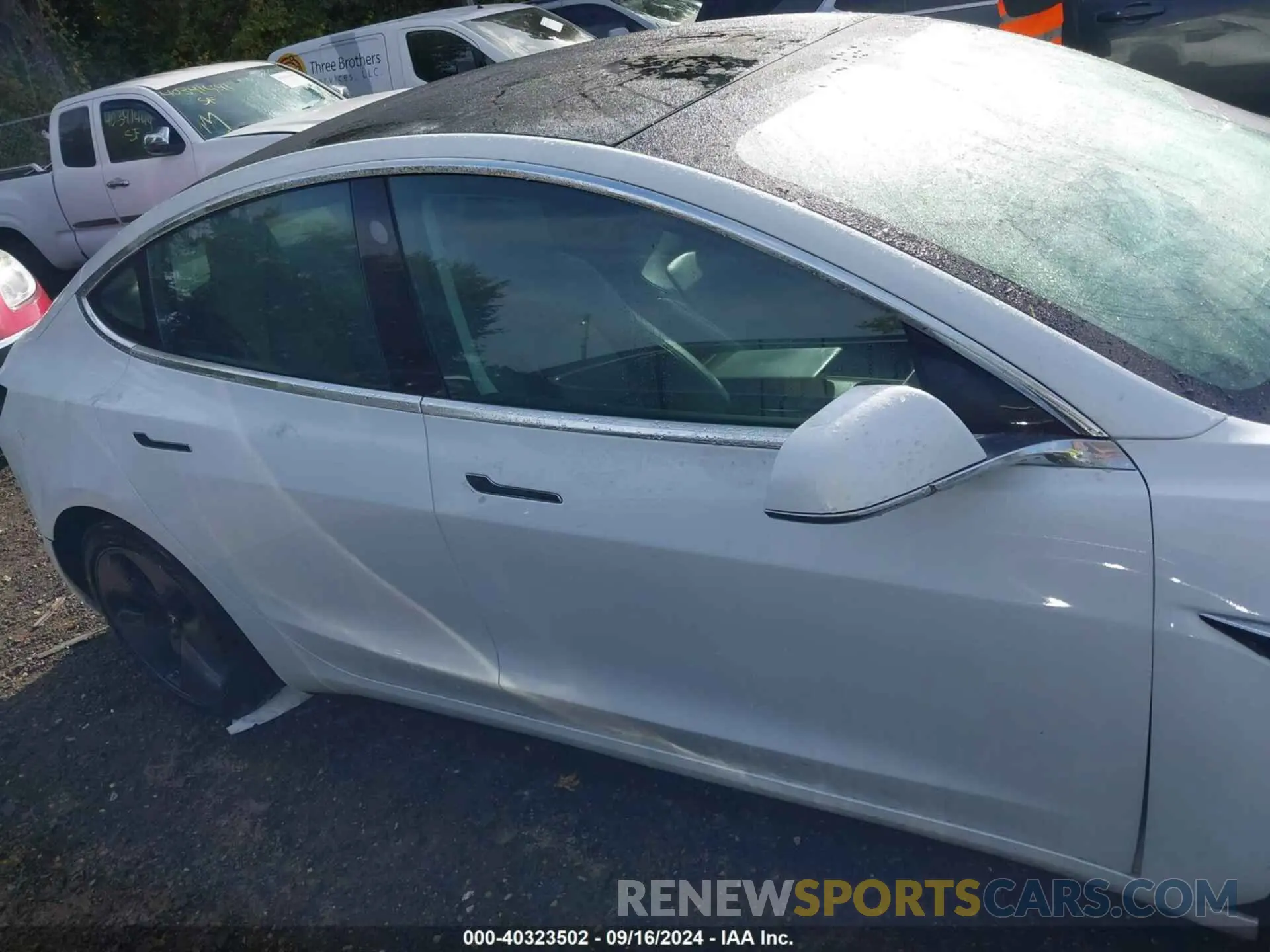 12 Photograph of a damaged car 5YJ3E1EB1KF359599 TESLA MODEL 3 2019