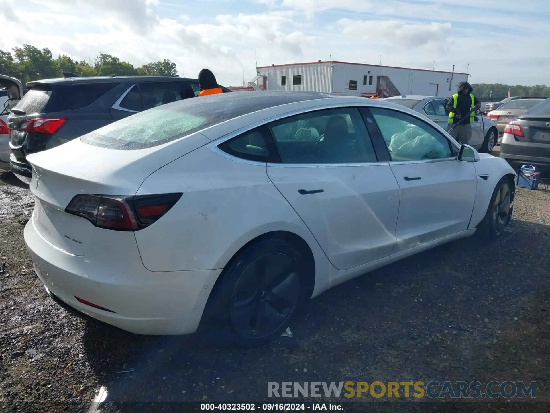 4 Photograph of a damaged car 5YJ3E1EB1KF359599 TESLA MODEL 3 2019