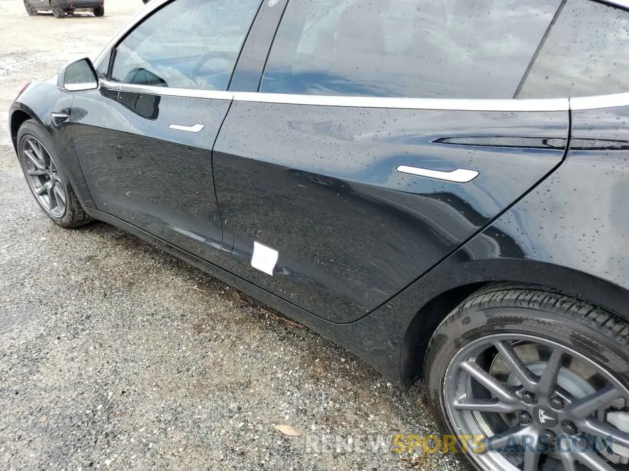 12 Photograph of a damaged car 5YJ3E1EB1KF384745 TESLA MODEL 3 2019