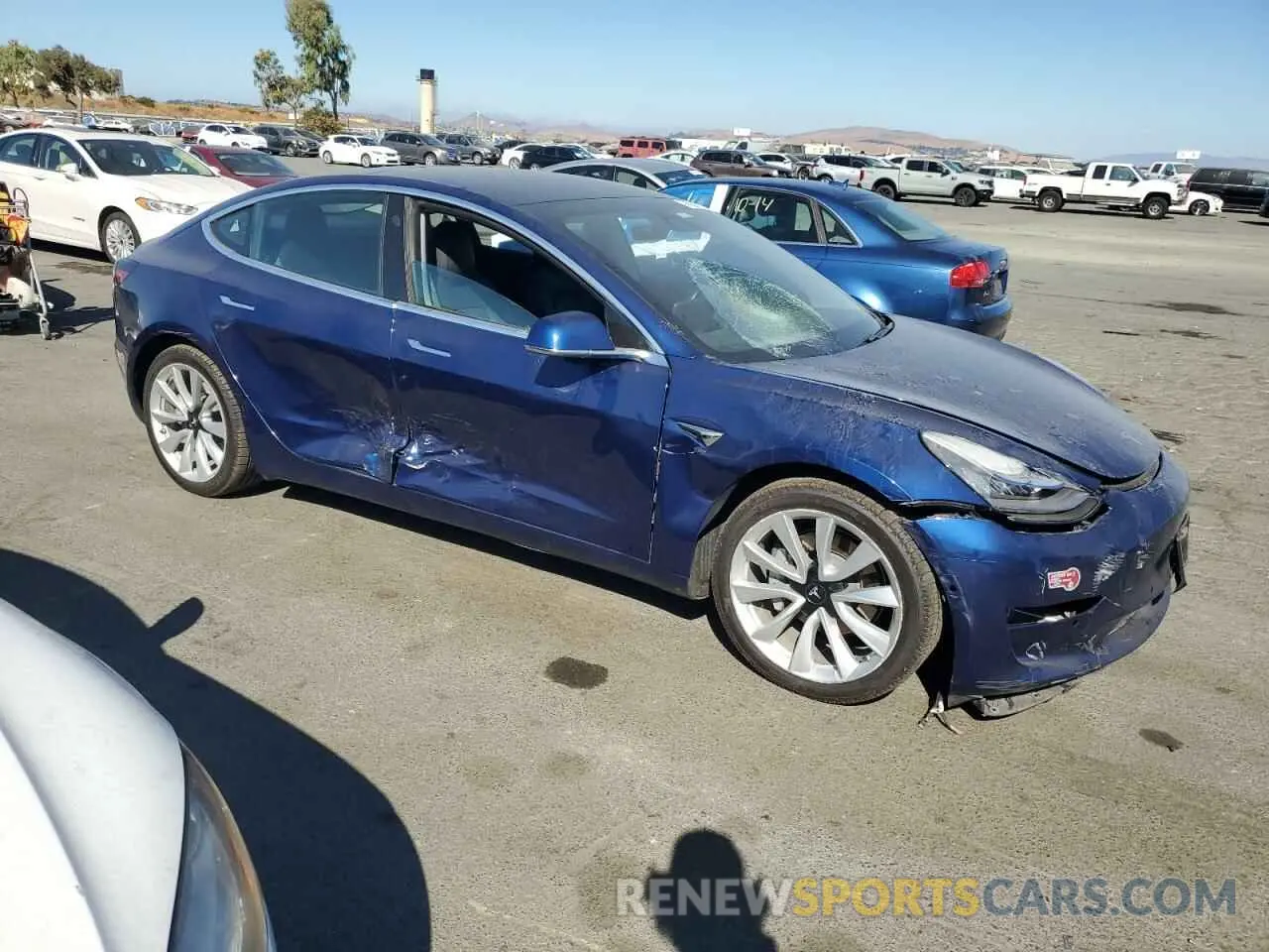 4 Photograph of a damaged car 5YJ3E1EB1KF390058 TESLA MODEL 3 2019