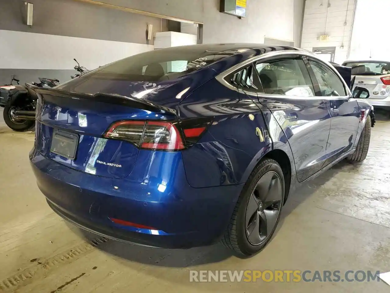 4 Photograph of a damaged car 5YJ3E1EB1KF442157 TESLA MODEL 3 2019