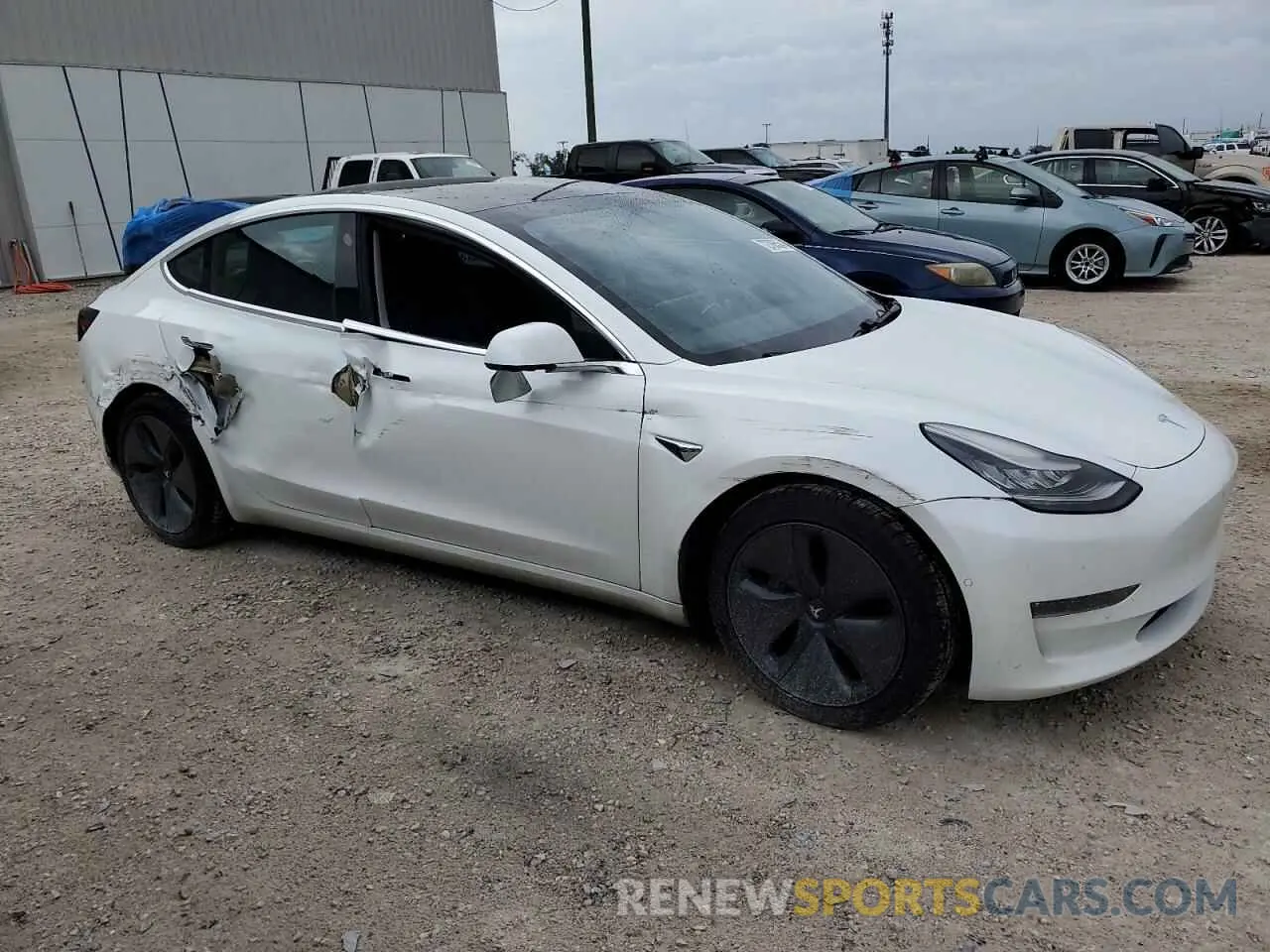 4 Photograph of a damaged car 5YJ3E1EB1KF493805 TESLA MODEL 3 2019