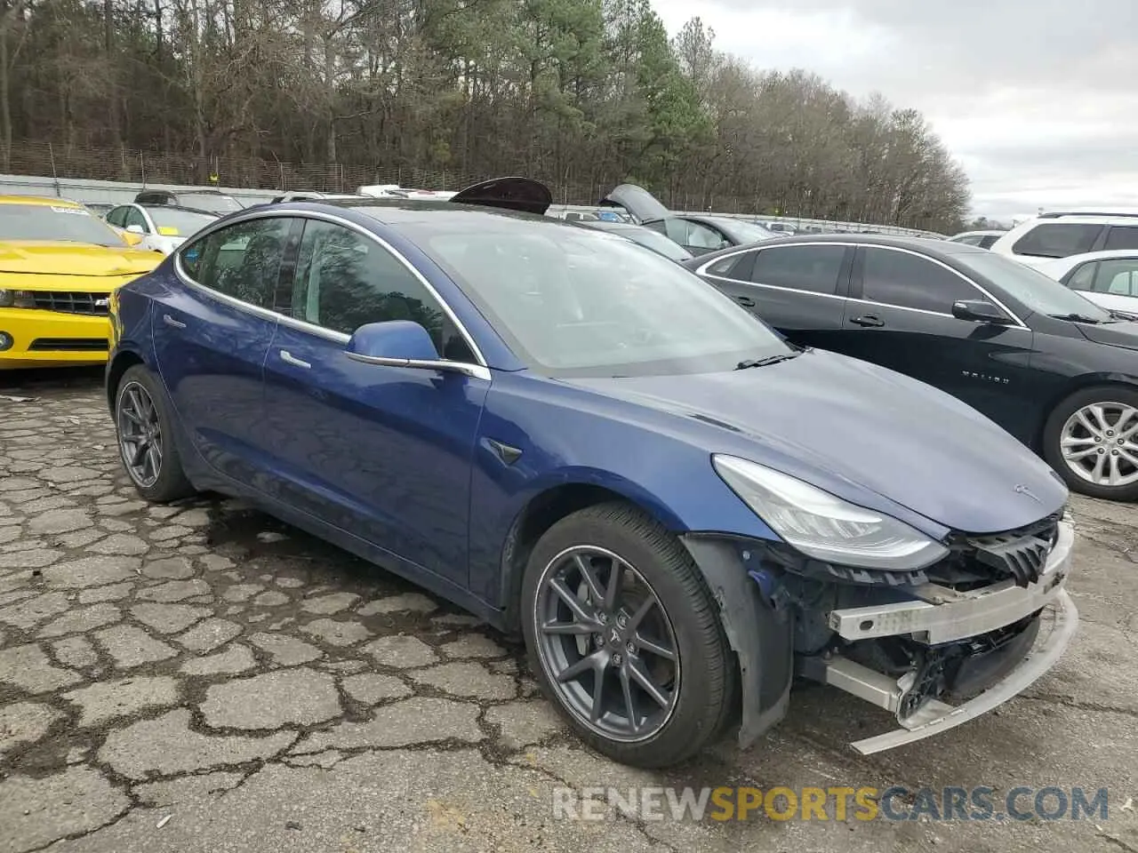 4 Photograph of a damaged car 5YJ3E1EB2KF359465 TESLA MODEL 3 2019
