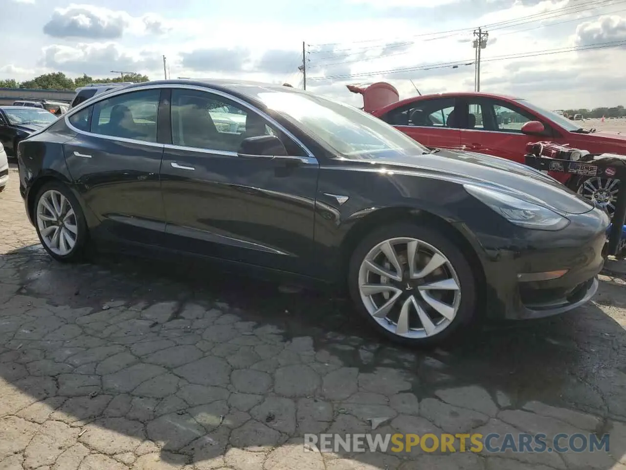 4 Photograph of a damaged car 5YJ3E1EB2KF365329 TESLA MODEL 3 2019
