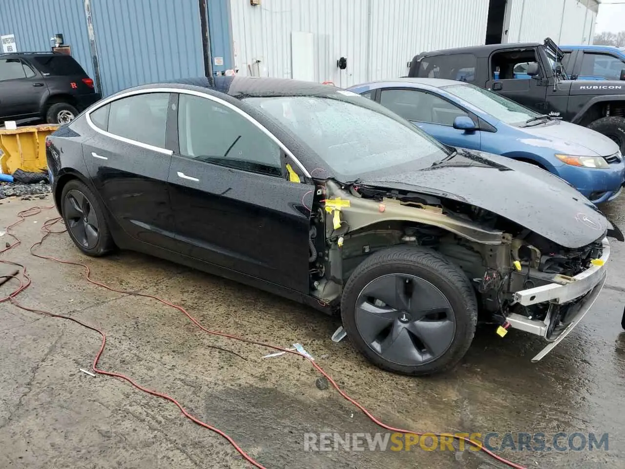 4 Photograph of a damaged car 5YJ3E1EB2KF384303 TESLA MODEL 3 2019