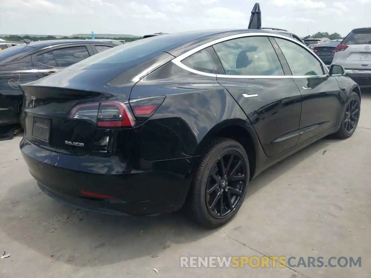 4 Photograph of a damaged car 5YJ3E1EB2KF385368 TESLA MODEL 3 2019