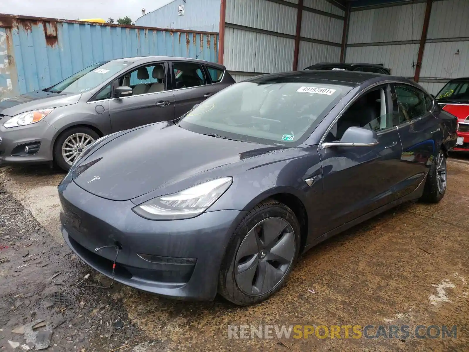 2 Photograph of a damaged car 5YJ3E1EB2KF386519 TESLA MODEL 3 2019