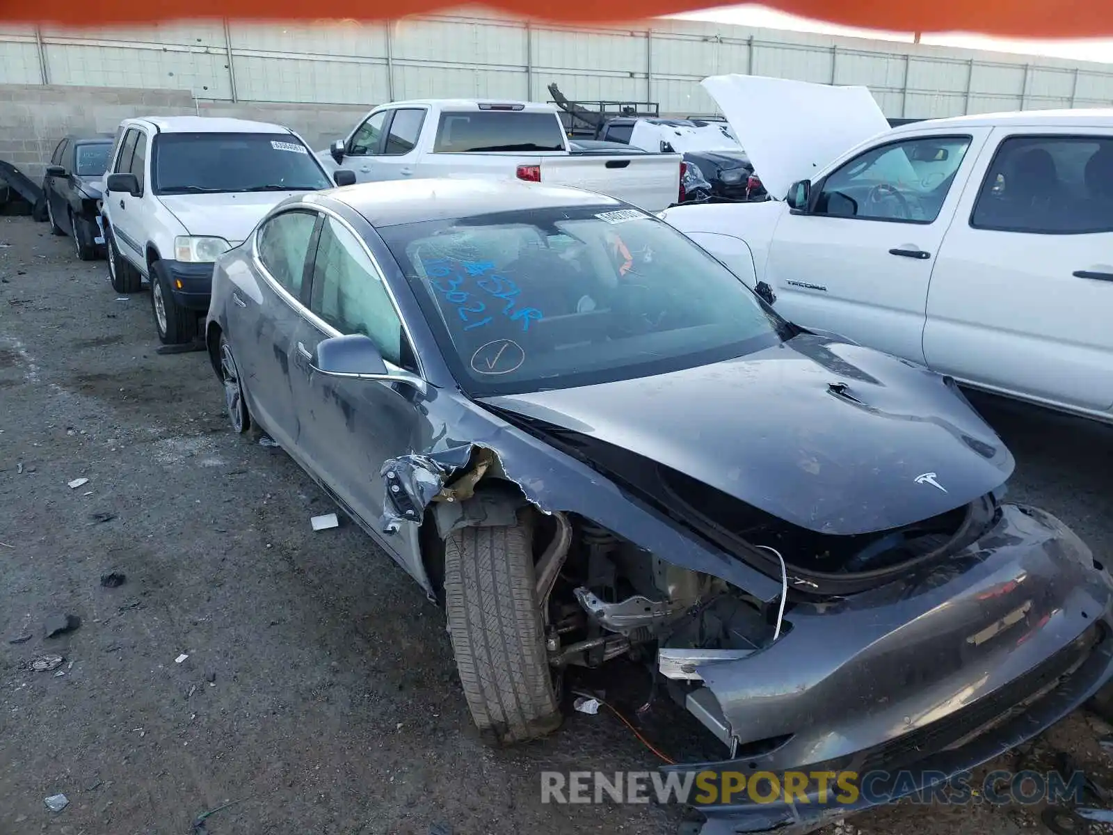 1 Photograph of a damaged car 5YJ3E1EB2KF386715 TESLA MODEL 3 2019