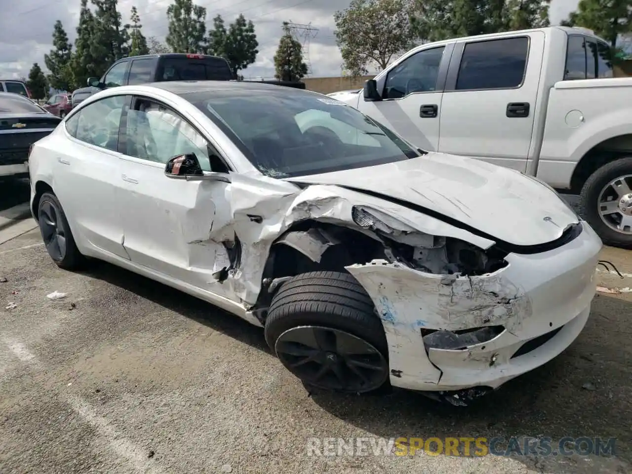 4 Photograph of a damaged car 5YJ3E1EB2KF452907 TESLA MODEL 3 2019