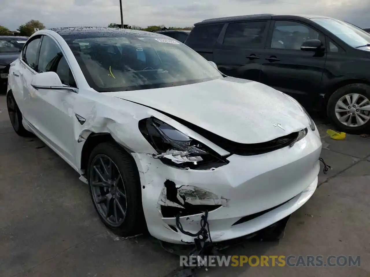 1 Photograph of a damaged car 5YJ3E1EB2KF469223 TESLA MODEL 3 2019