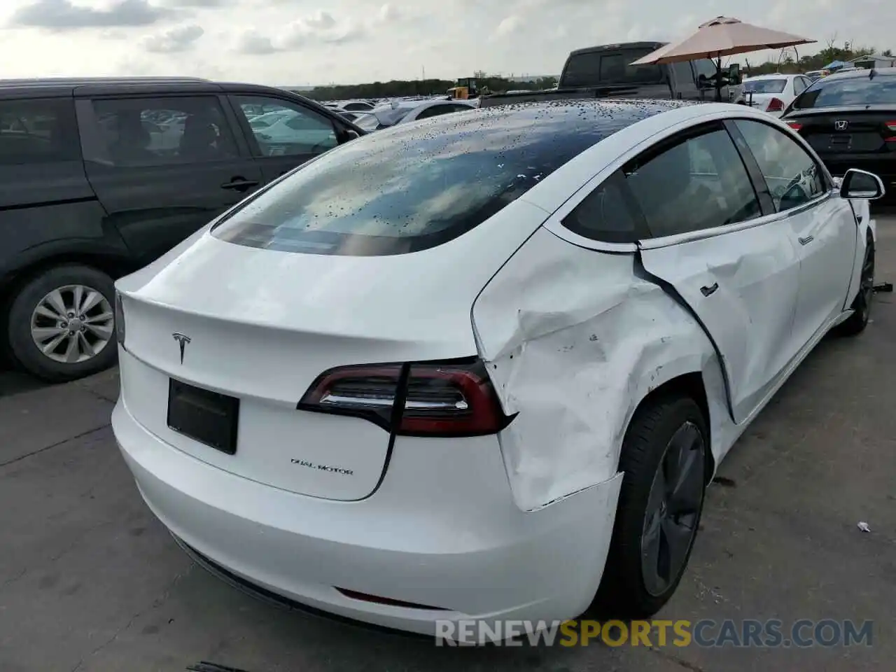 4 Photograph of a damaged car 5YJ3E1EB2KF469223 TESLA MODEL 3 2019