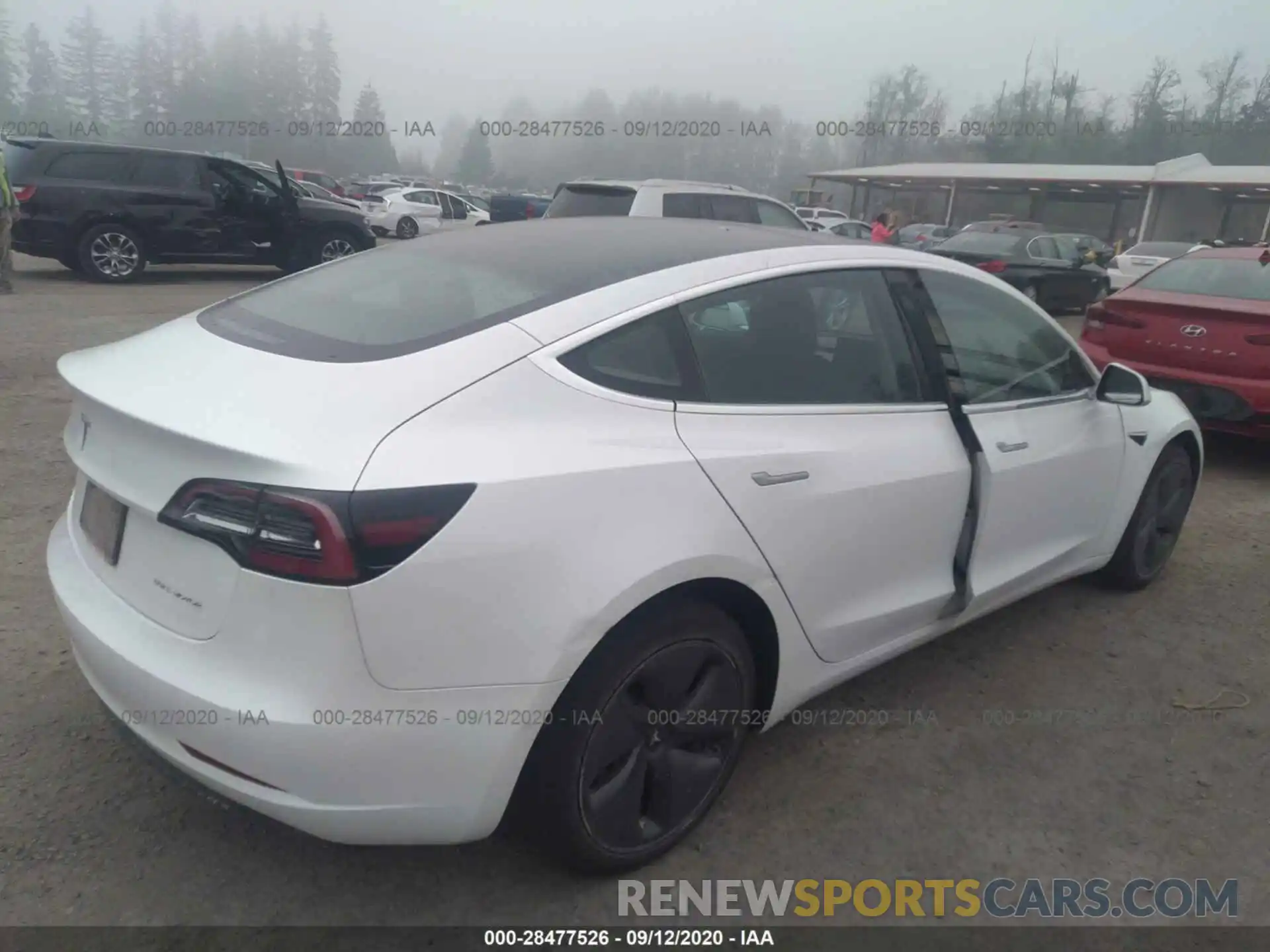 4 Photograph of a damaged car 5YJ3E1EB2KF510630 TESLA MODEL 3 2019