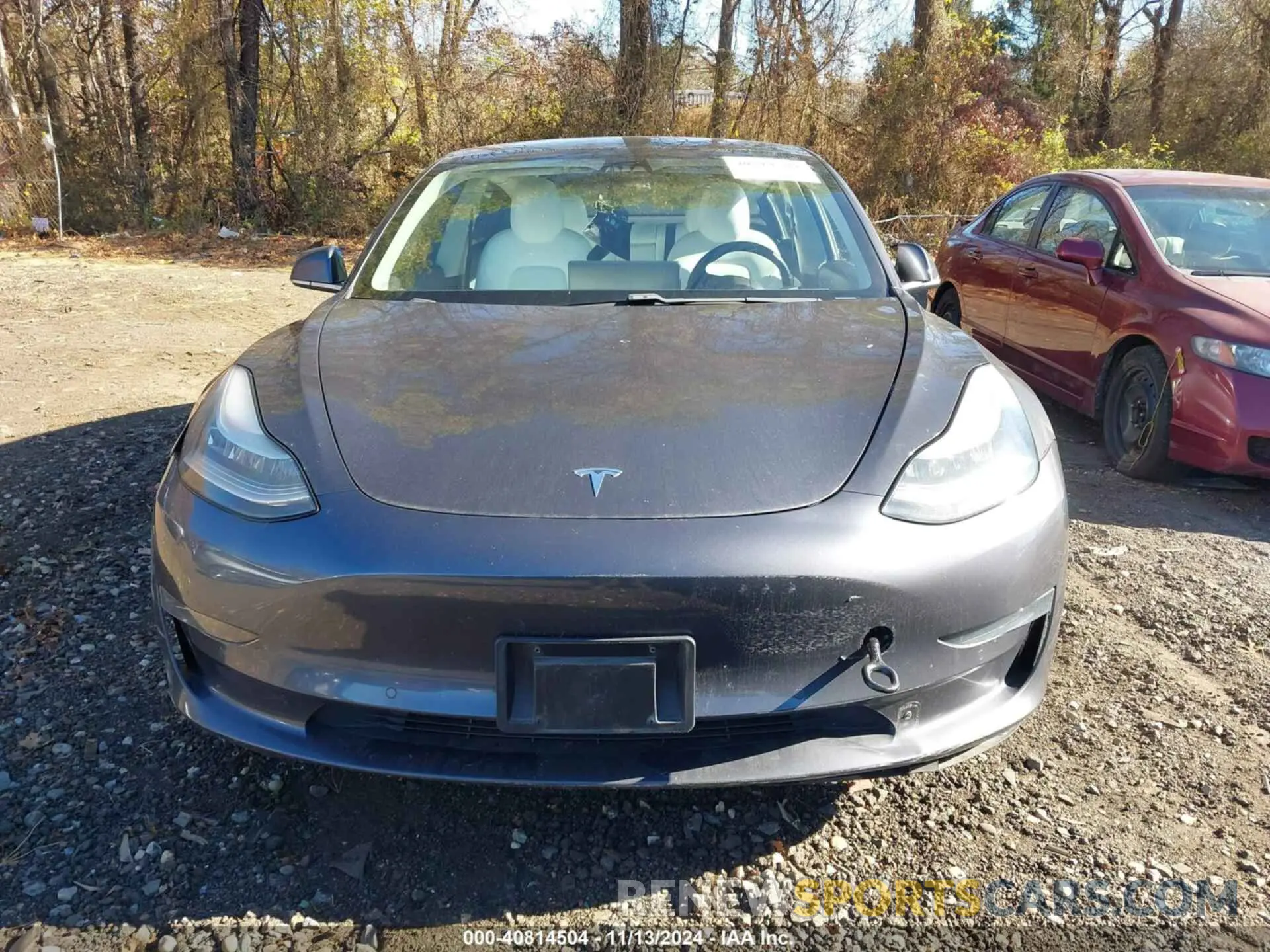 12 Photograph of a damaged car 5YJ3E1EB3KF195725 TESLA MODEL 3 2019