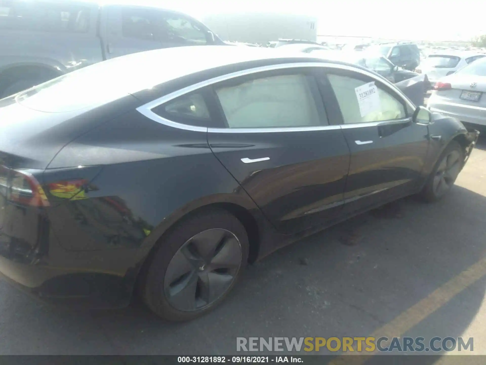 4 Photograph of a damaged car 5YJ3E1EB3KF390546 TESLA MODEL 3 2019