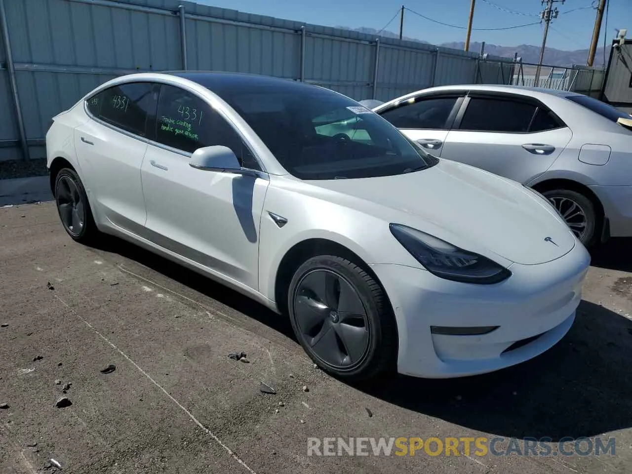 4 Photograph of a damaged car 5YJ3E1EB3KF493840 TESLA MODEL 3 2019