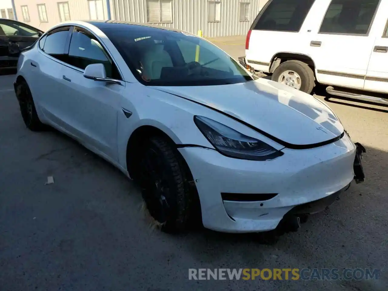 1 Photograph of a damaged car 5YJ3E1EB4KF195118 TESLA MODEL 3 2019