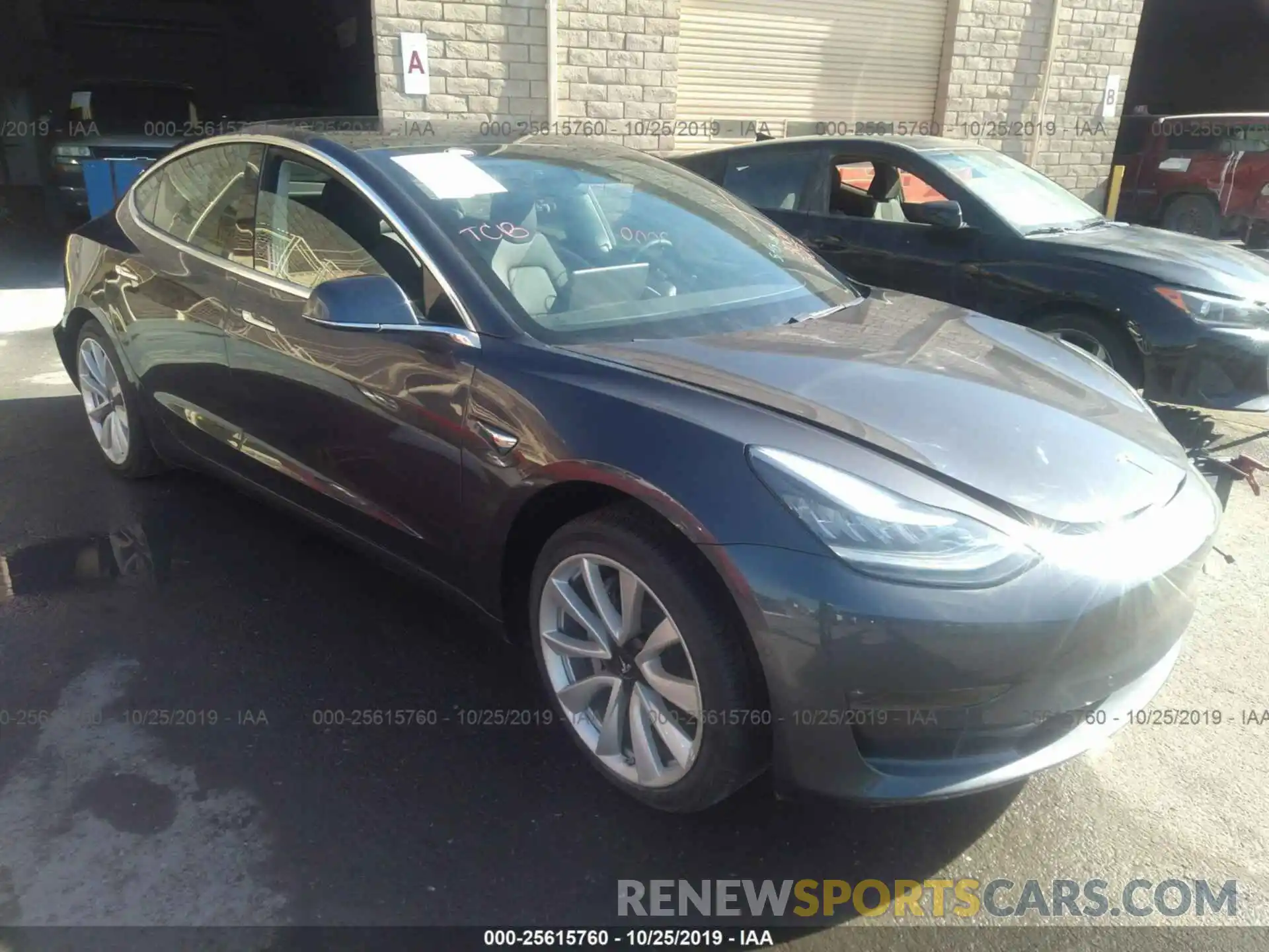 1 Photograph of a damaged car 5YJ3E1EB4KF364733 TESLA MODEL 3 2019